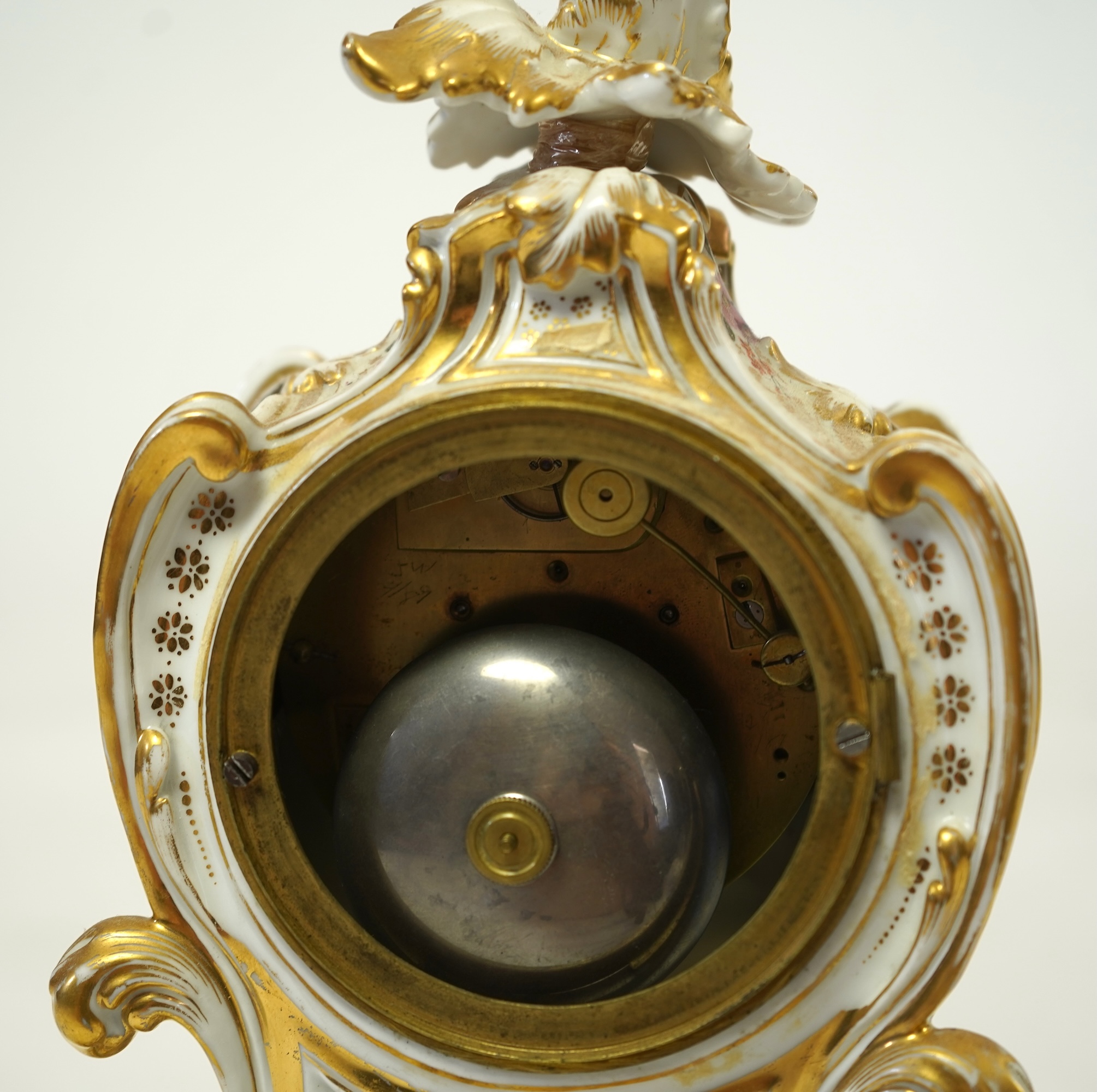A mid 19th century French porcelain floral and gilt decorated clock, by Jacob Petit